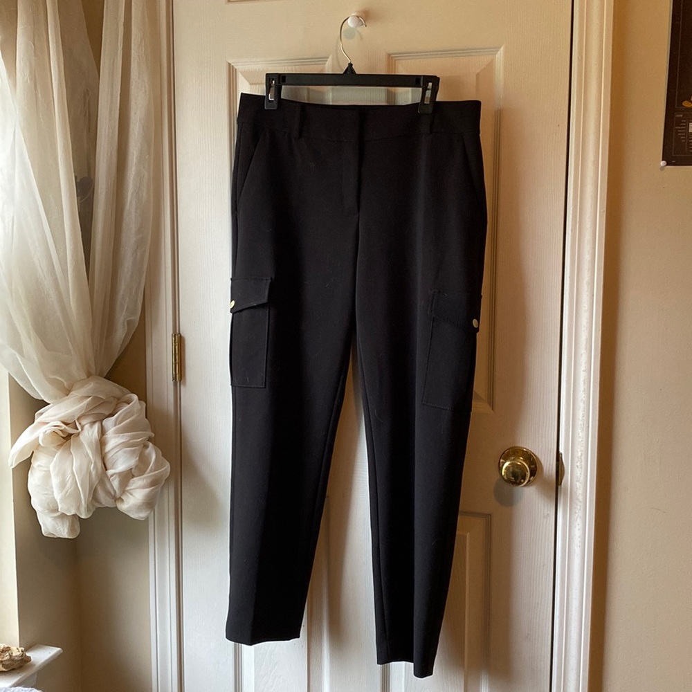 Black jogger style dress pants with pockets on the side